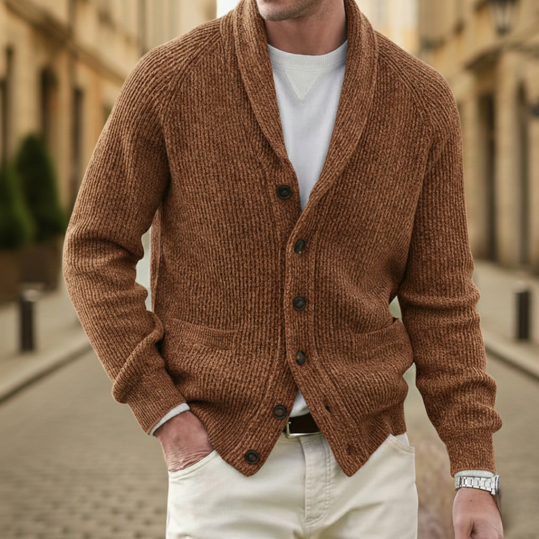 A man wearing a brown shawl-collar cardigan showing a refined and casual style.