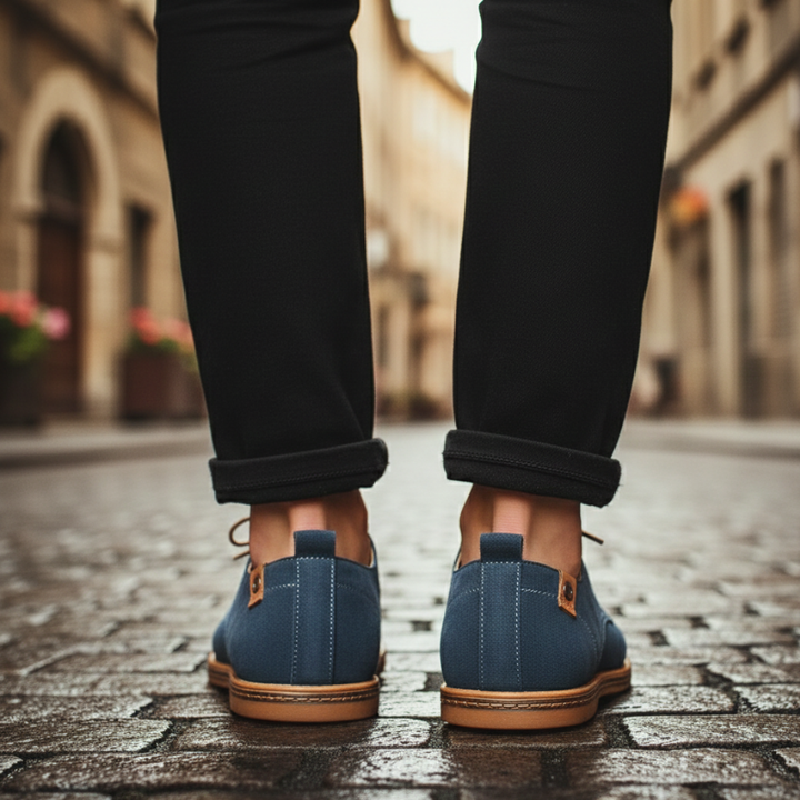 Blue suede derby shoes with a lace-up design, featuring a rounded toe and low rubber heel for smart-casual wear.