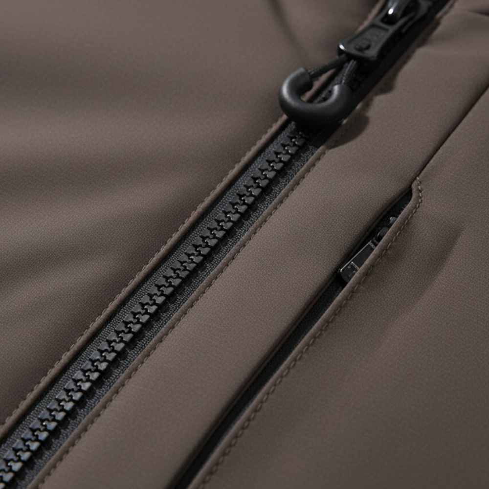 Unisex brown parka, featuring a hood, insulated design, and a streamlined silhouette for winter wear.