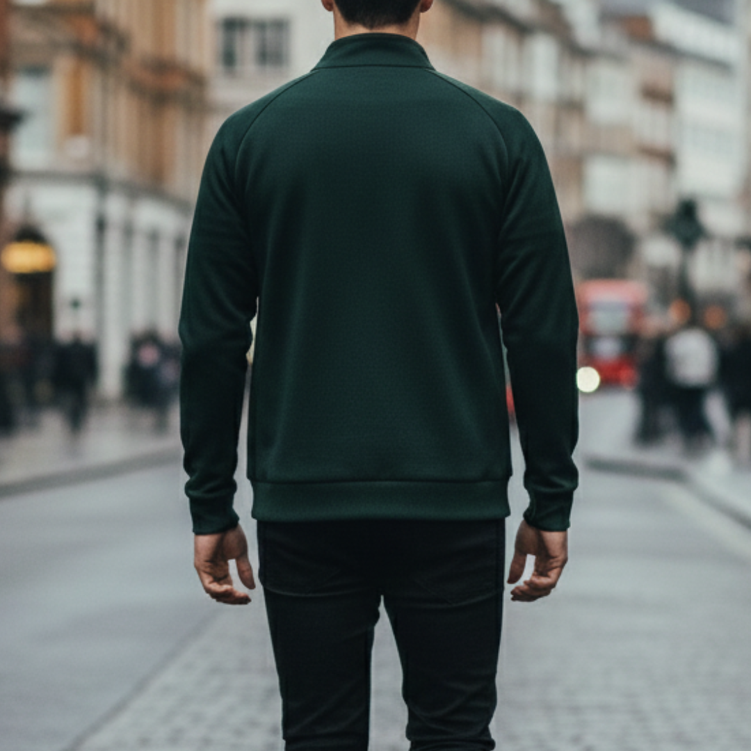 Back-detailed look of the green zip-up jacket with a stand collar, long sleeves, and a modern design suitable for casual wear.