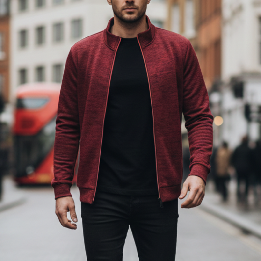 Red zip-up jacket with a stand collar, long sleeves, and a modern design suitable for casual wear.
