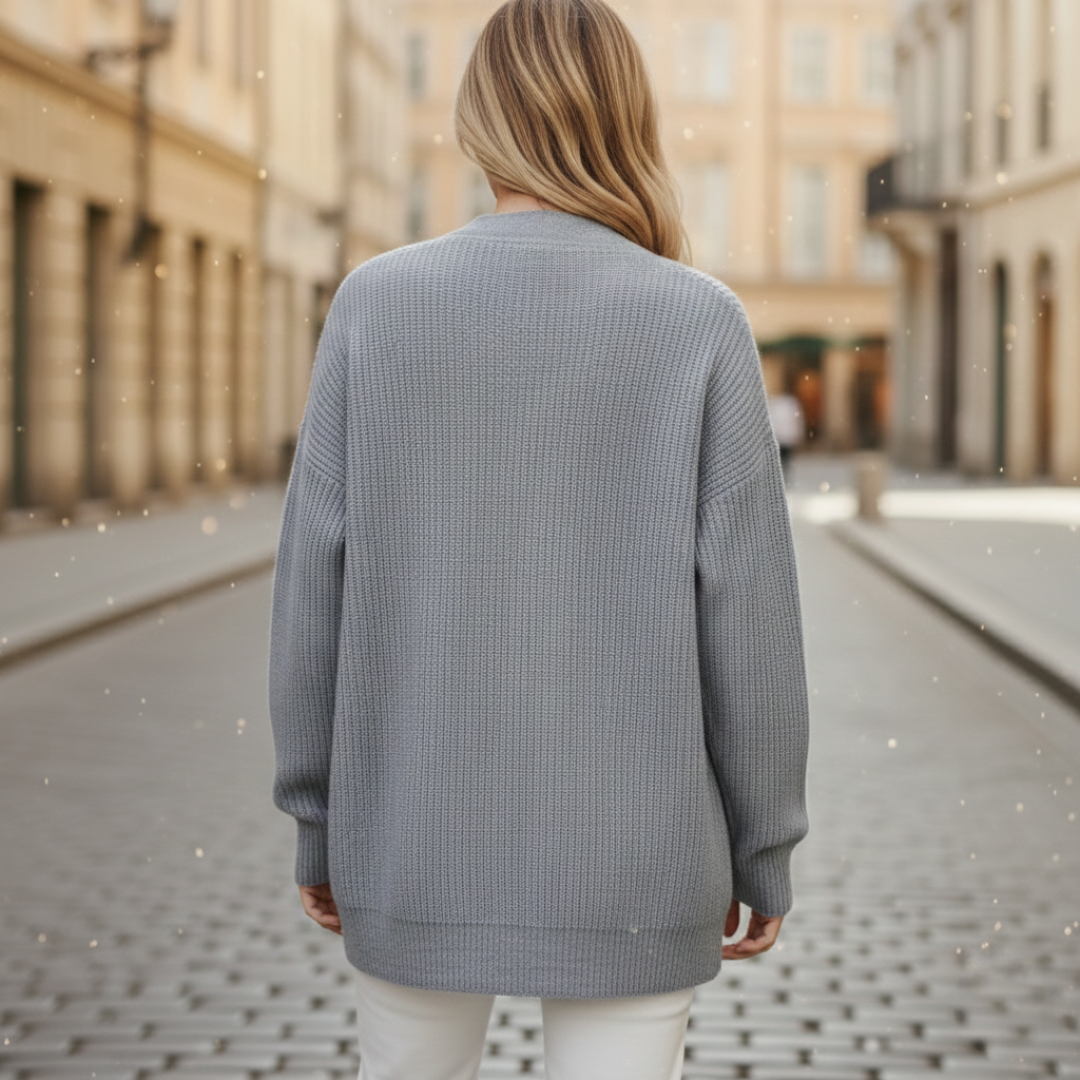 Knit Cardigan in soft cashmere, featuring a relaxed fit, button closure, and long sleeves for versatile cool-weather wear.