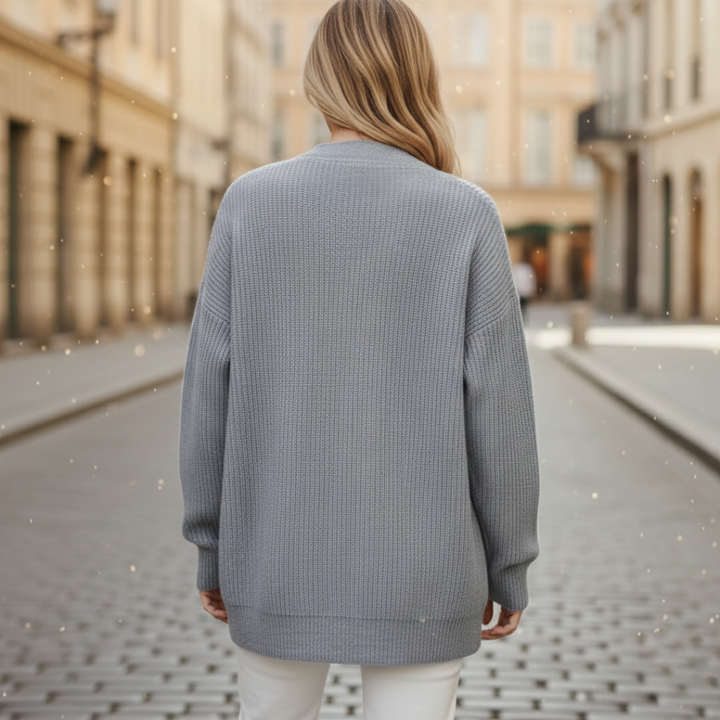 Knit Cardigan in soft cashmere, featuring a relaxed fit, button closure, and long sleeves for versatile cool-weather wear.