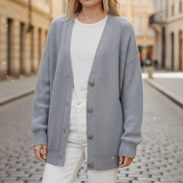Knit Cardigan in soft cashmere, featuring a relaxed fit, button closure, and long sleeves for versatile cool-weather wear.