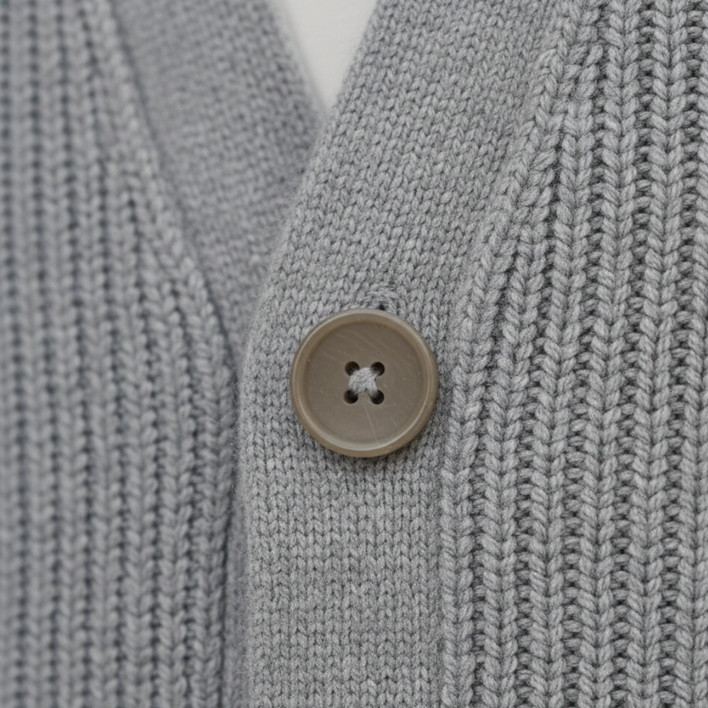Knit Cardigan in soft cashmere, featuring a relaxed fit, button closure, and long sleeves for versatile cool-weather wear.