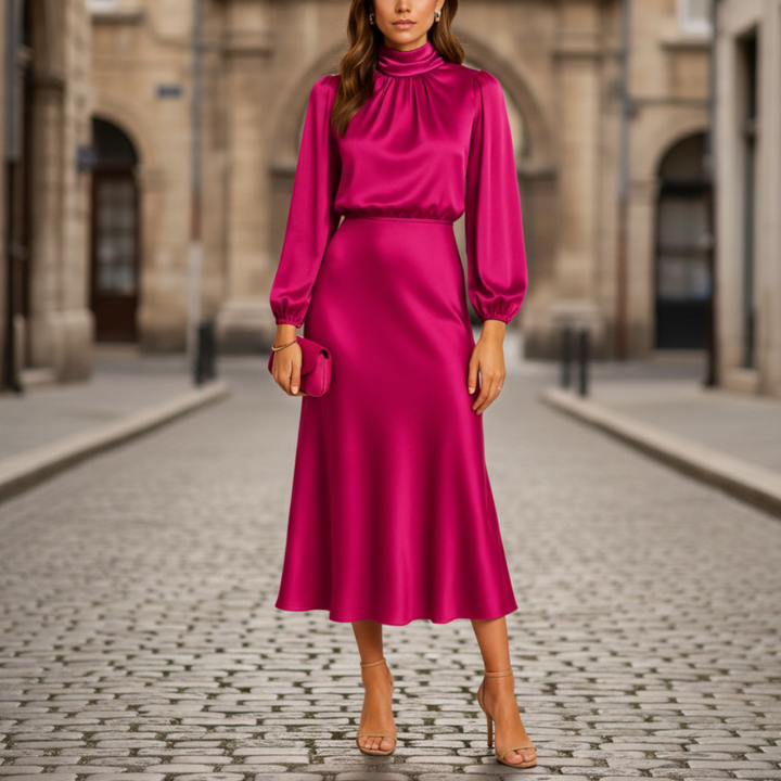 midi dress with long sleeves and high neck, featuring a gently cinched waist and flowing skirt for elegant movement.