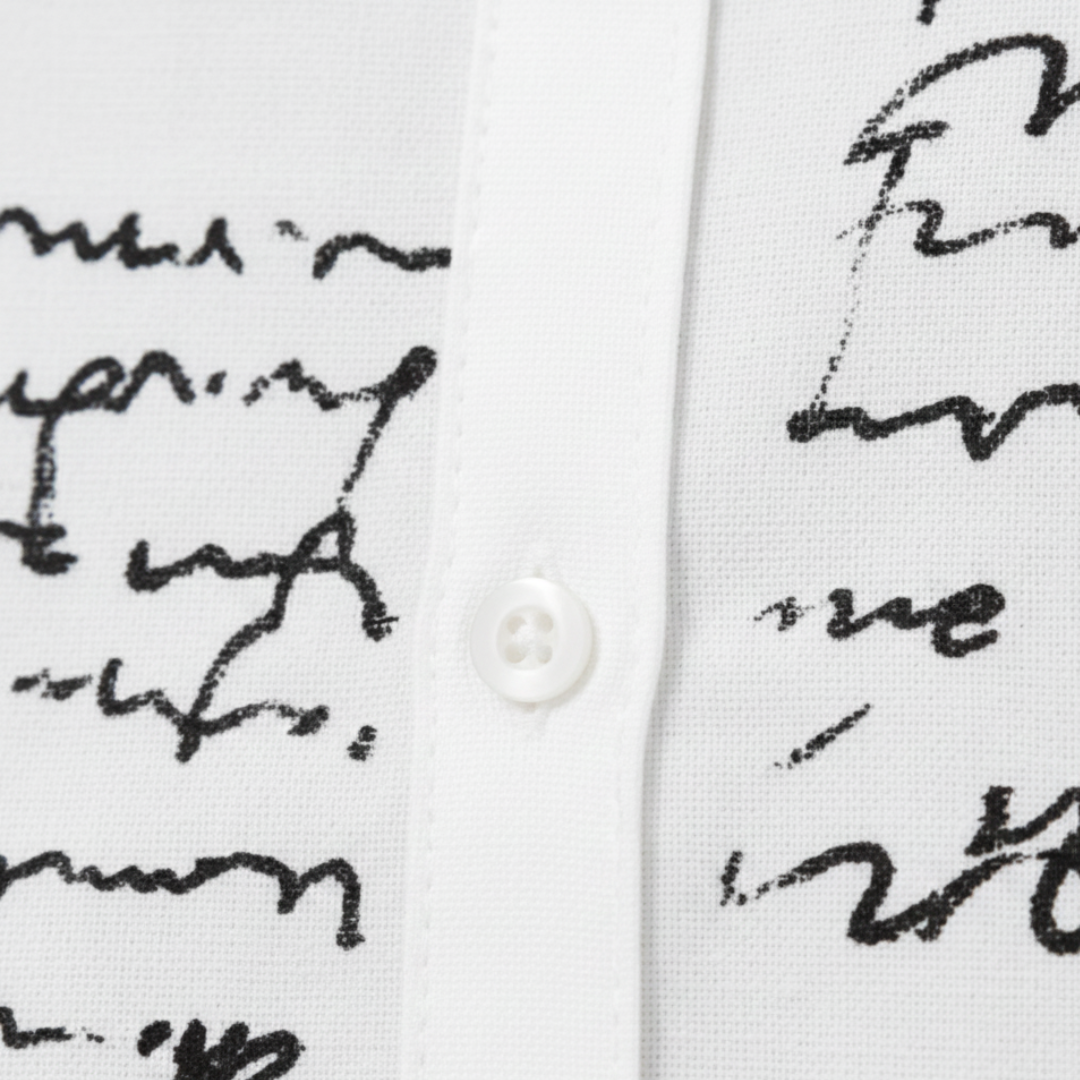 White midi shirt dress featuring elegant handwritten script, designed for a flattering fit and graceful movement in fall and spring.