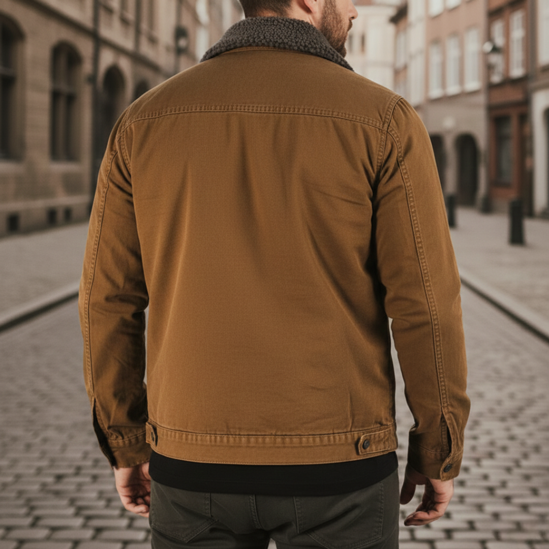 Men's utility jacket with a fur collar, featuring a button front, functional pockets, and a soft sherpa lining for warmth.