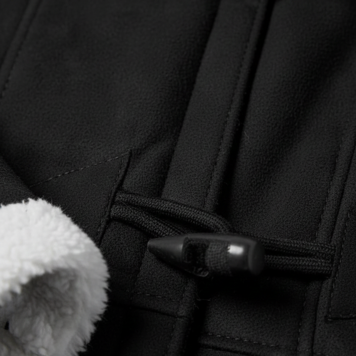 Black hooded coat with a white collar and toggle closures, designed for warmth and elegance in fall and winter.