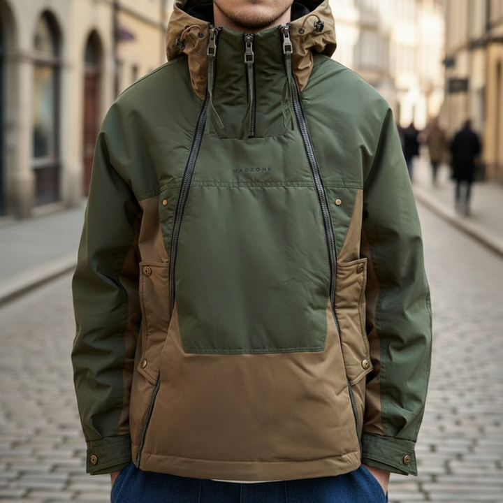 A man dressed in a green and brown utility jacket with a lace-up front.