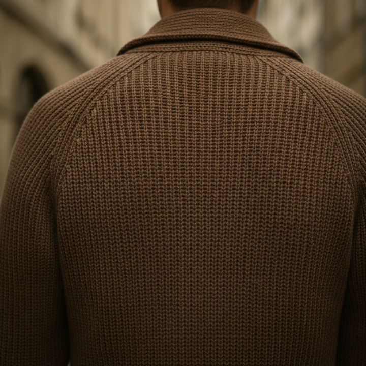  A brown sweater with a turn-down collar and long sleeves.