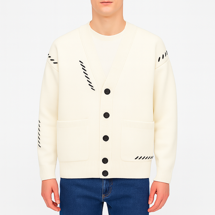 Button-up cardigan with a V-neckline, ribbed cuffs and hem, front patch pockets, and decorative stitched detailing.