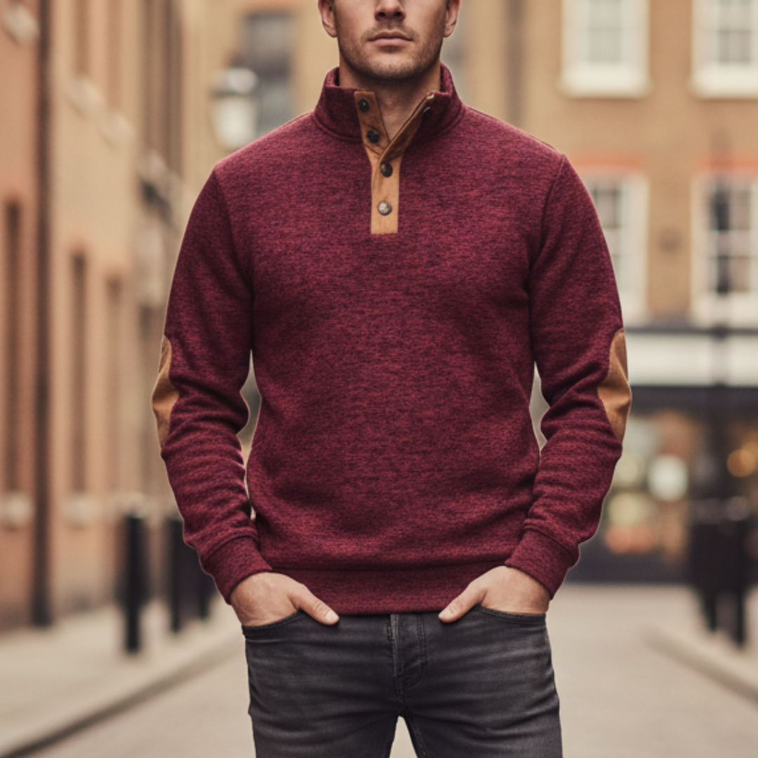 Red sweater with tan elbow patches, high collar, and button details