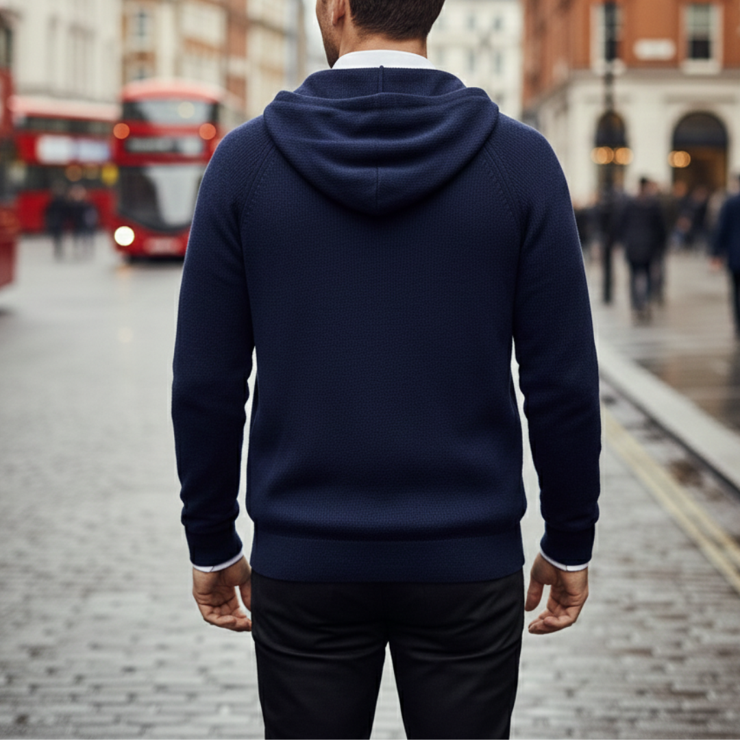 Back details of navy hooded cardigan in ribbed knit, featuring a zip-up front and relaxed fit, ideal for fall and winter layering.
