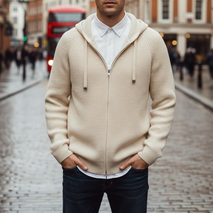 Beige hooded cardigan in ribbed knit, featuring a zip-up front and relaxed fit, ideal for fall and winter layering.