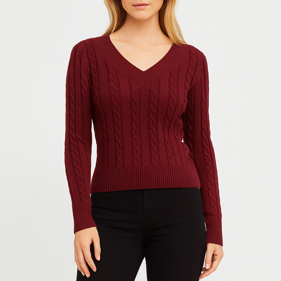 V-neck jumper with a cable knit design, ribbed cuffs, and hem.