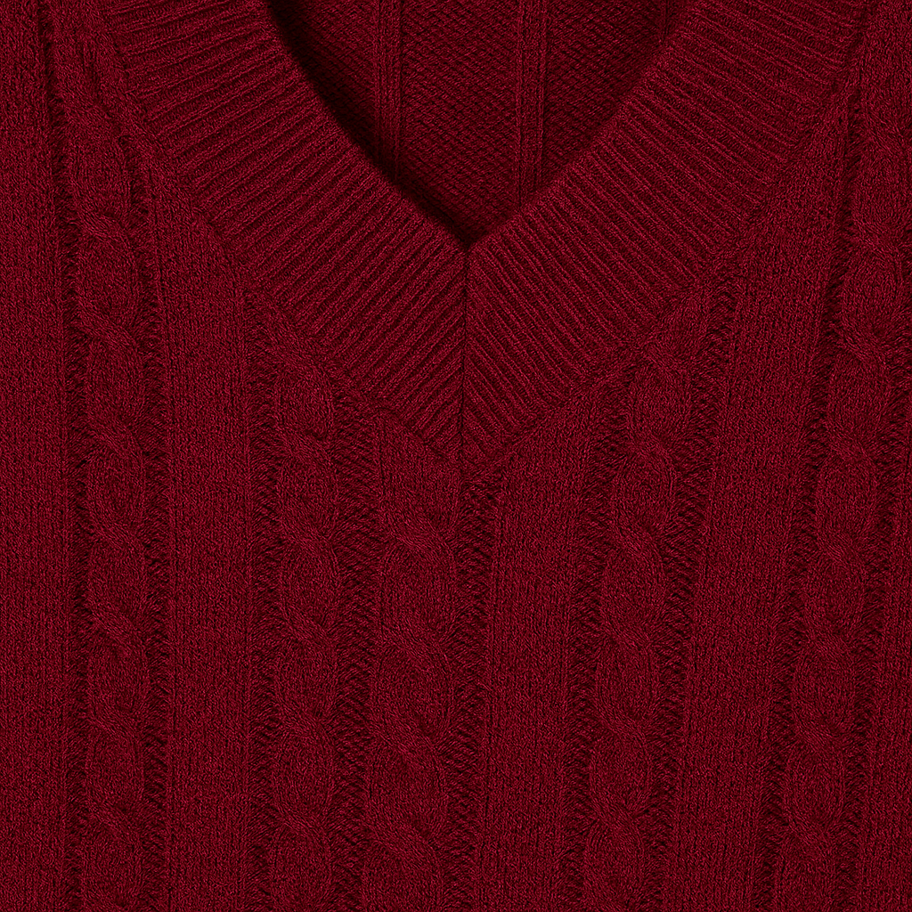 V-neck jumper with a cable knit design, ribbed cuffs, and hem.