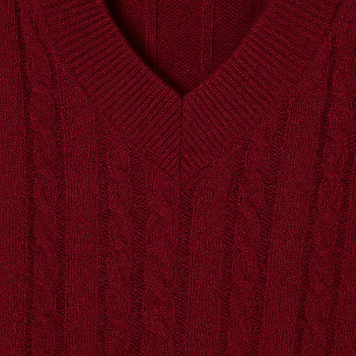V-neck jumper with a cable knit design, ribbed cuffs, and hem.