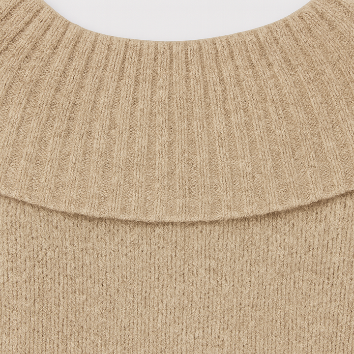 Off-the-shoulder knitted jumper with a wide ribbed neckline, long sleeves, and a relaxed fit.