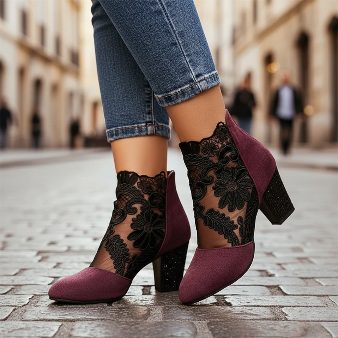 Women's red suede ankle boots with lace detailing, zip closure, and block heel, perfect for fall and spring styling.