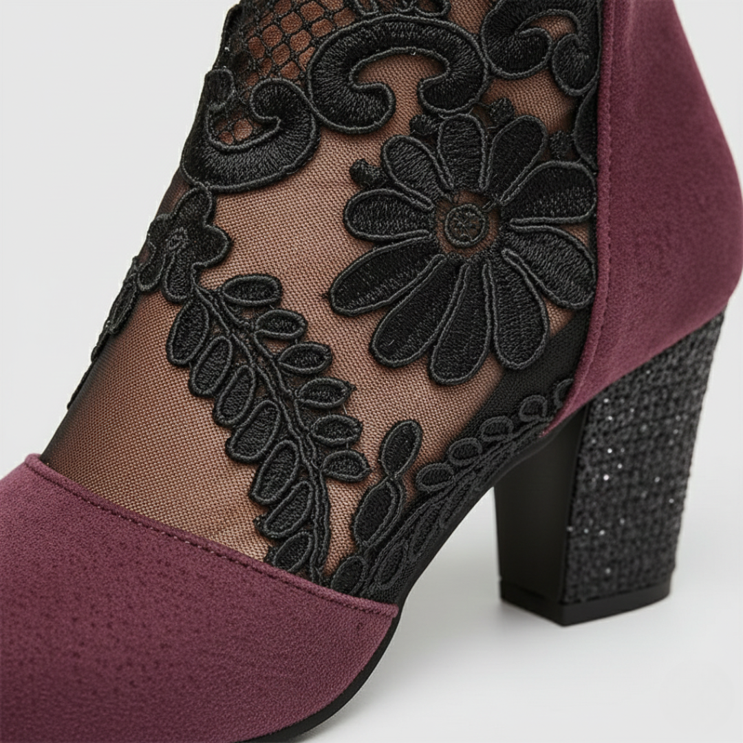 Women's red suede ankle boots with lace detailing, zip closure, and block heel, perfect for fall and spring styling.