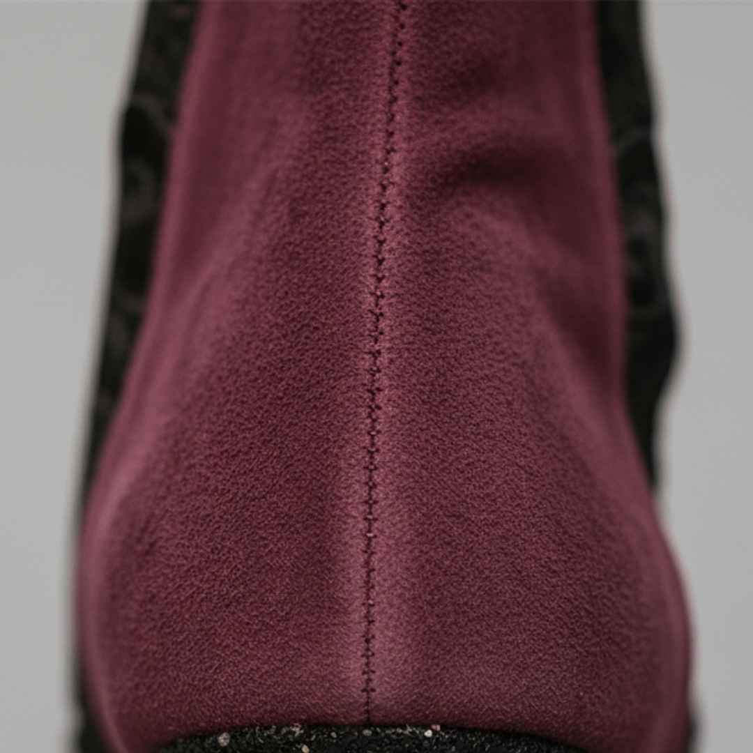 Women's red suede ankle boots with lace detailing, zip closure, and block heel, perfect for fall and spring styling.