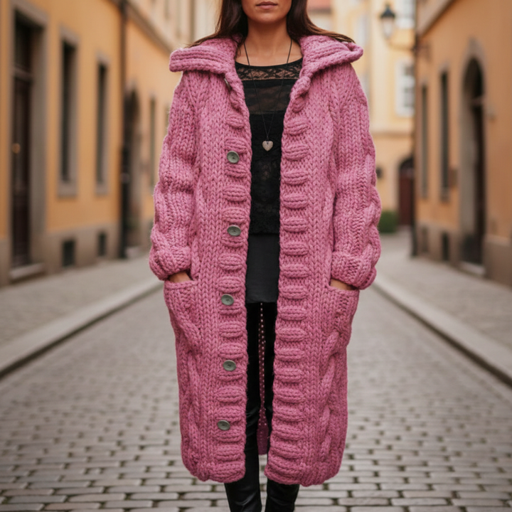 Long sleeve women's cardigan with a hood, featuring chunky knit and button front, designed for warmth in fall and winter.