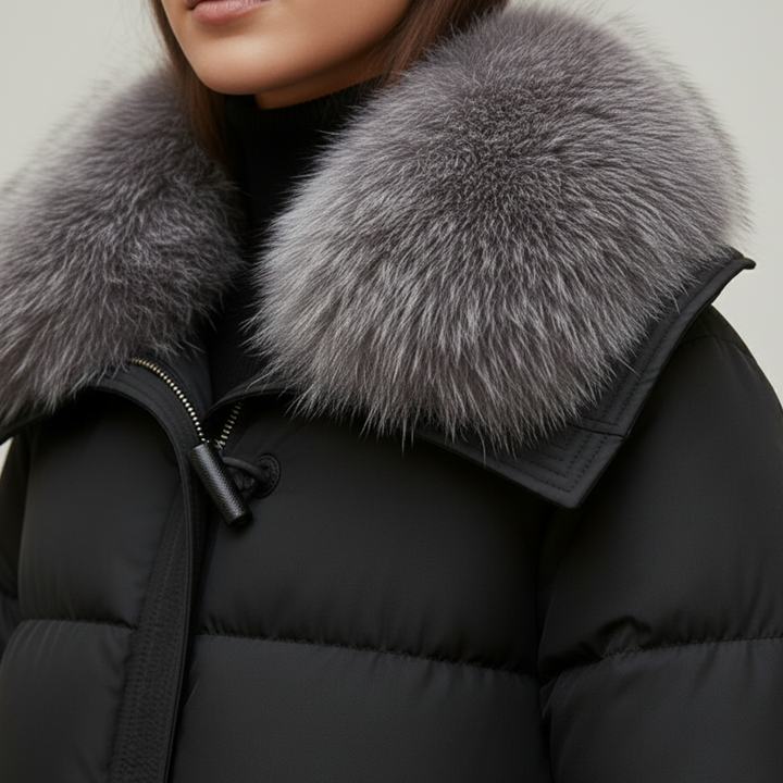 Close-up details of black puffy jacket with an oversized faux-fur collar, designed for warmth and elegance in fall and winter.