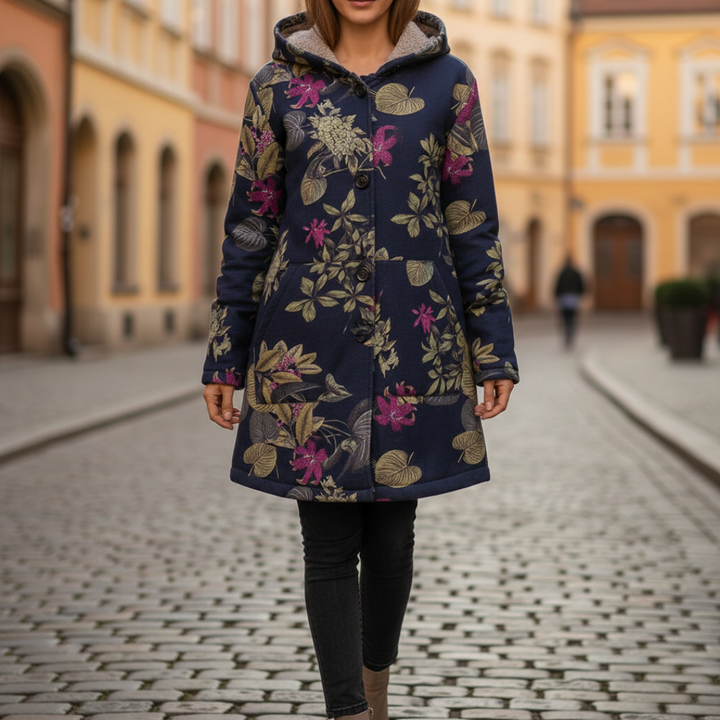 Close-up of a floral print jacket featuring a soft fleece lining and hood, perfect for fall and spring outings.