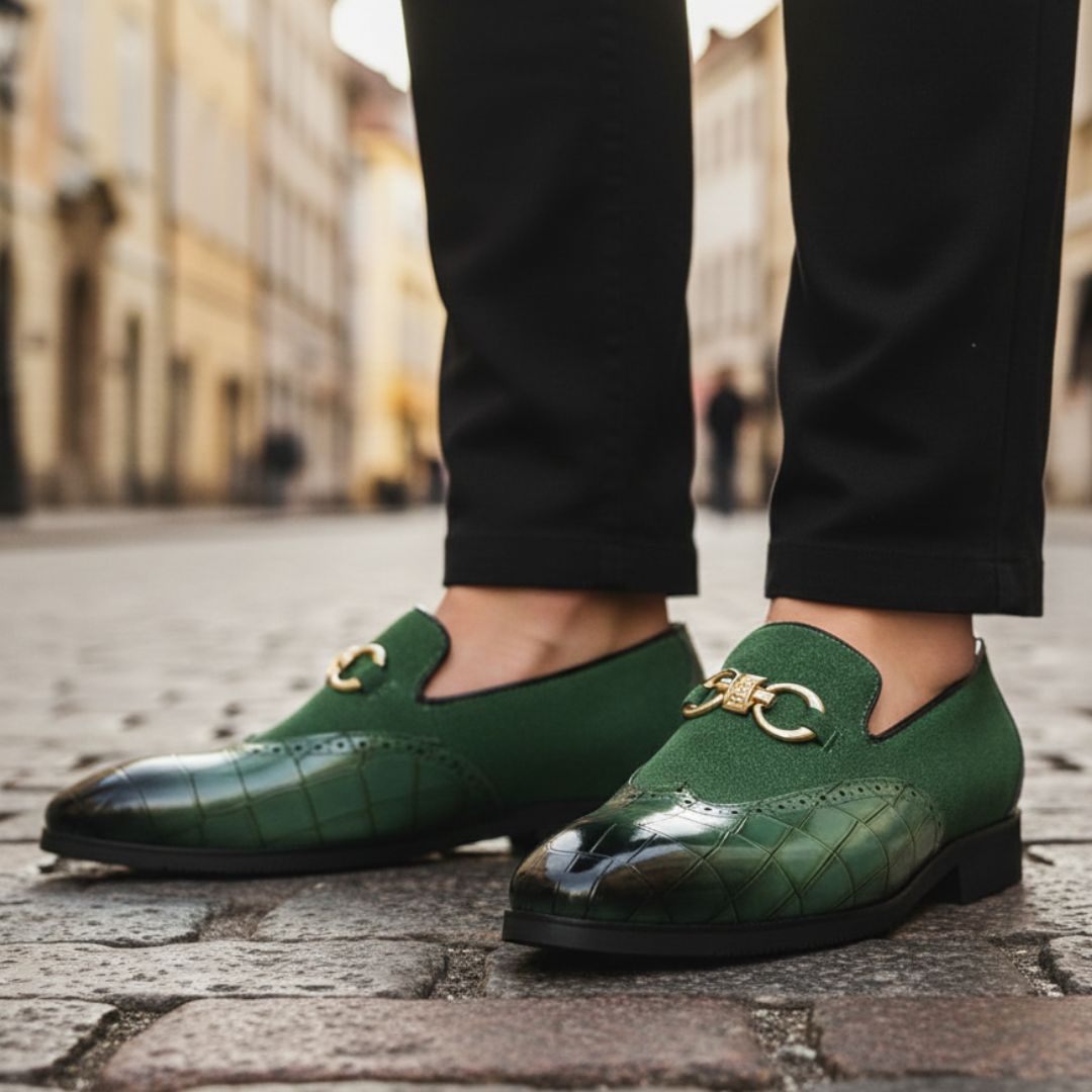 Green leather loafers with gold detailing, featuring a croc-embossed texture and square toe, ideal for formal occasions.

