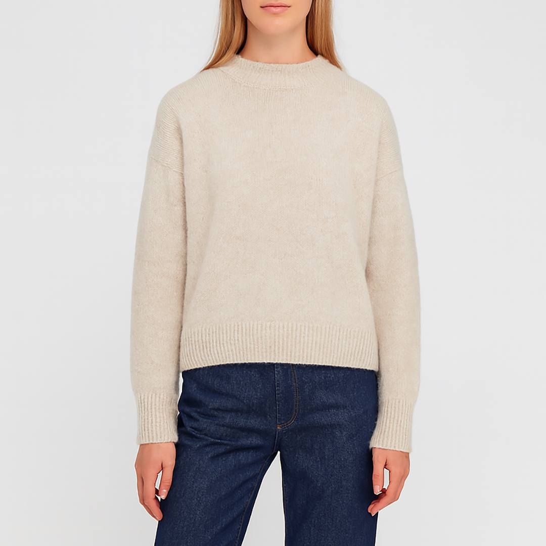 Crew neck jumper with a soft textured finish, ribbed cuffs, and hem.