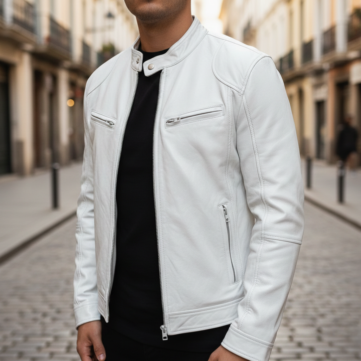 Leather jacket displayed on a white background, showcasing a hip-length design with long sleeves and zip details.