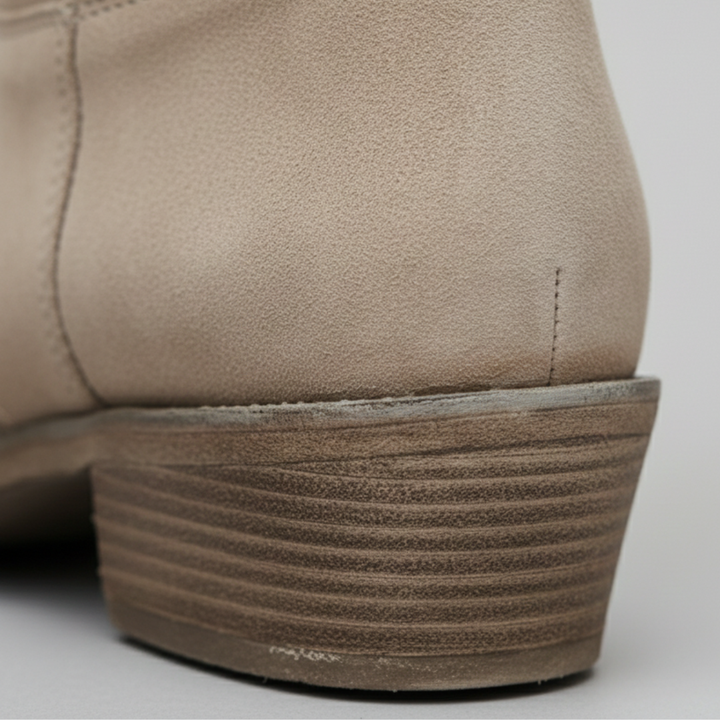 brown suede ankle boots, showcasing a style suitable for fall and spring.