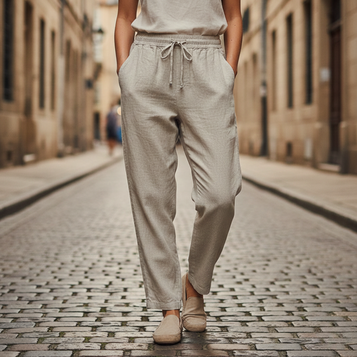 Khaki linen trousers, featuring a pull-on waist and straight-leg design for casual outfits. 
