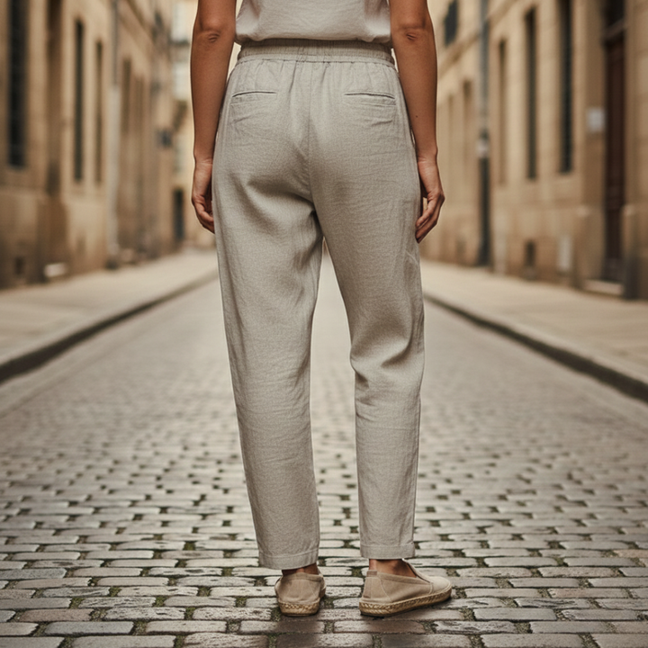Khaki linen trousers, featuring a pull-on waist and straight-leg design for casual outfits. 