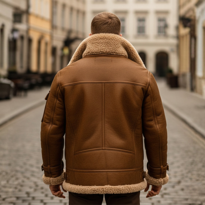 Back details of a man in a stylish brown shearling jacket, designed for warmth with a structured fit and long sleeves for winter wear.
