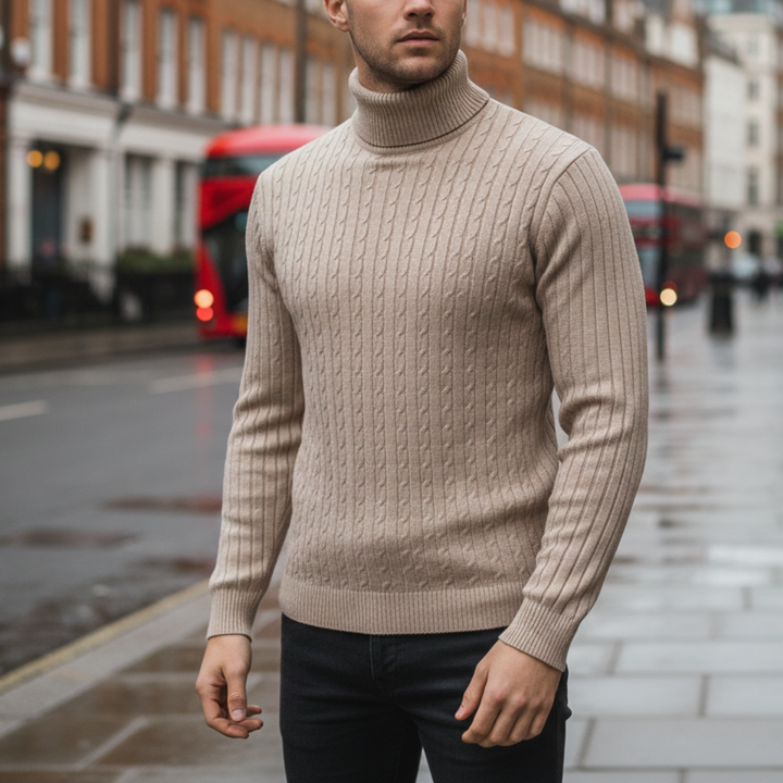 Beige cable-knit turtleneck sweater, hip length, long sleeves, good for fall and winter.