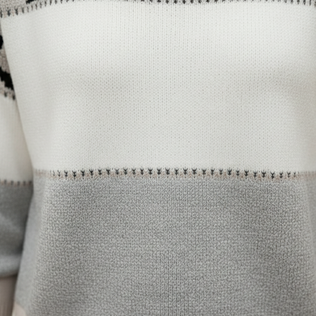 leopard print color block sweater with a round neckline and long sleeves, designed for comfort in cooler months.