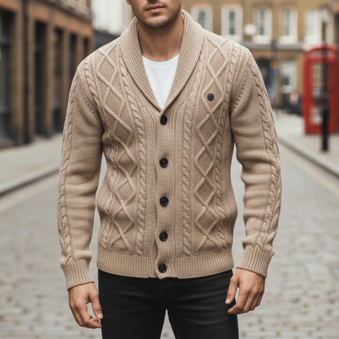 Winslow Cable Cardigan in knit fabric with a shawl collar and button-front closure, featuring a diamond-knit pattern.